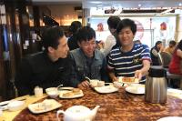 Mr Masaomi MURAKAMI (first from right) having dim sum lunch with the College students